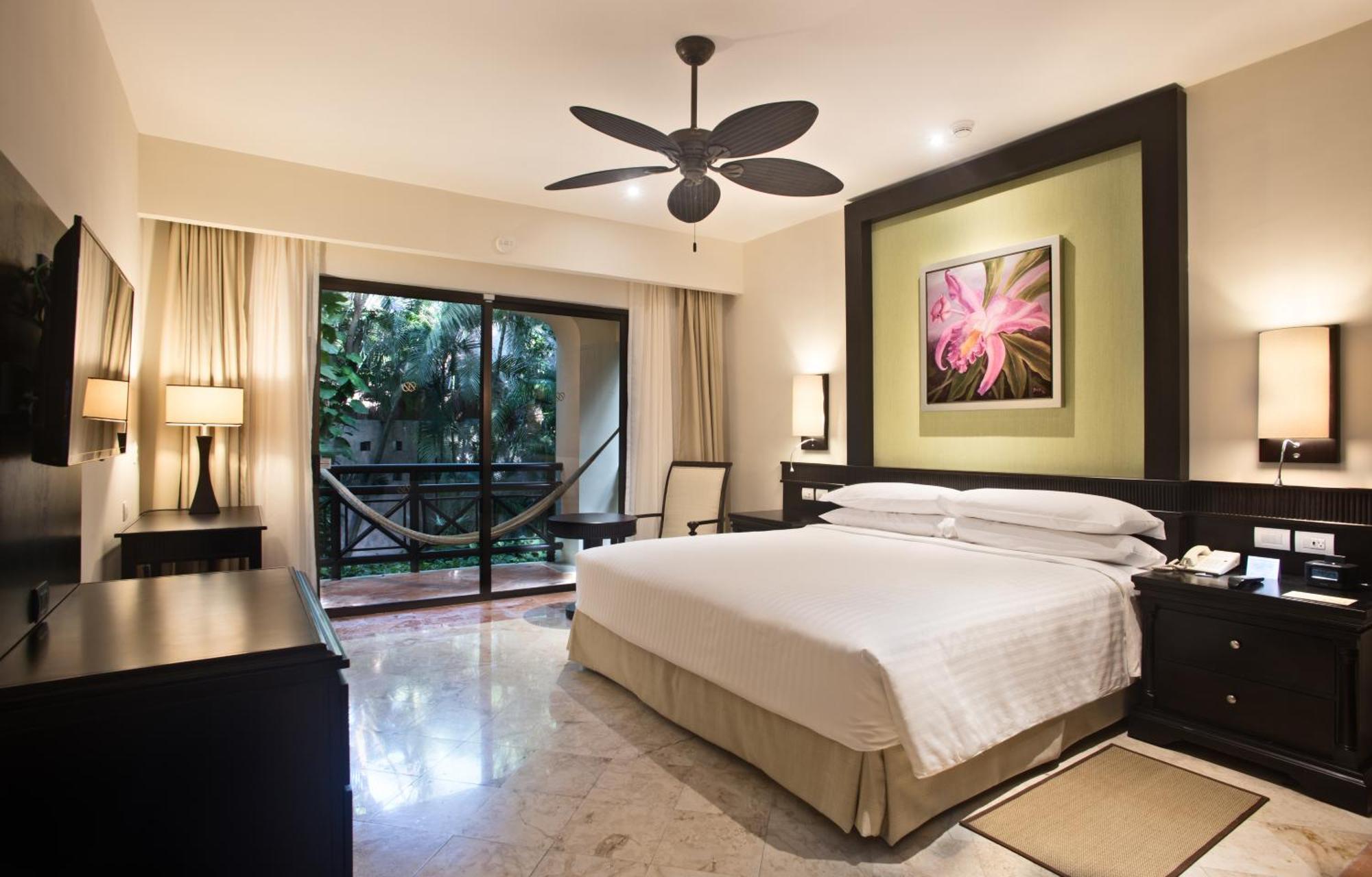 Occidental At Xcaret Destination Hotell Playa del Carmen Eksteriør bilde A bedroom at the Hard Rock Hotel