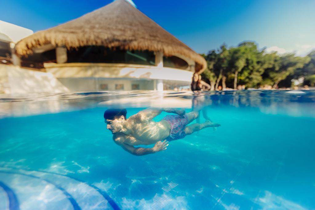 Occidental At Xcaret Destination Hotell Playa del Carmen Eksteriør bilde Swimming in a pool